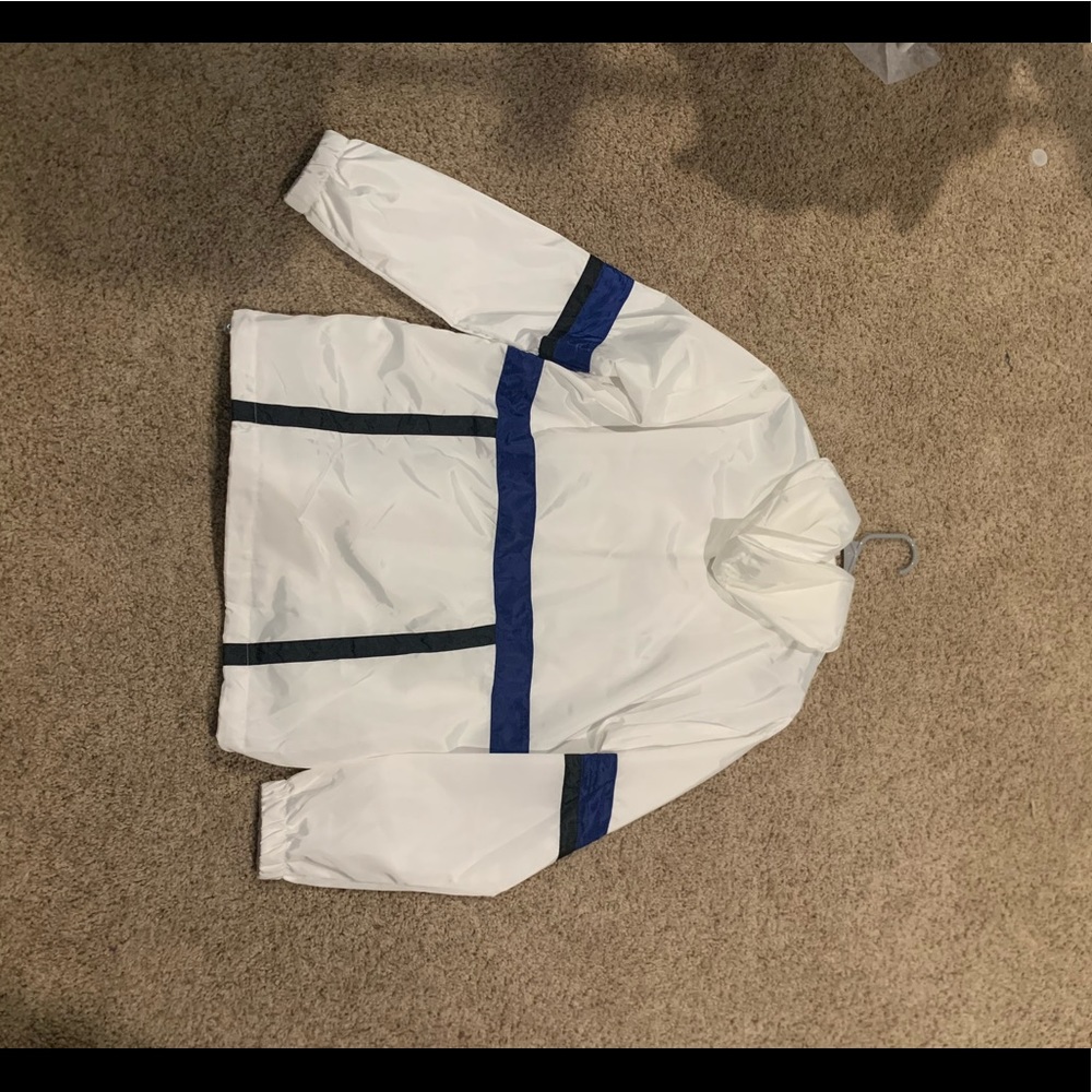 White windbreaker